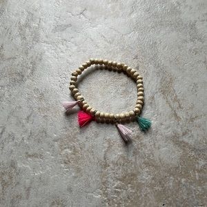 White bead and coloured tassel bracelet